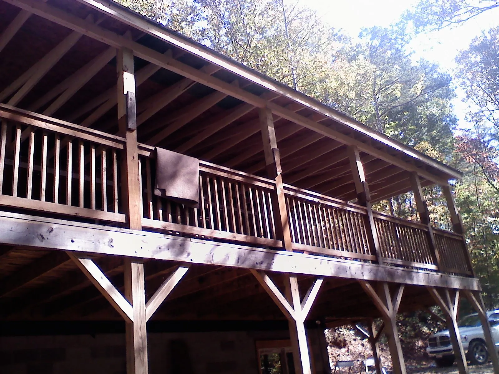 Timber framing under a new elevated porch and deck — Roof Leak Repair in Potwin by Roofing Brothers
